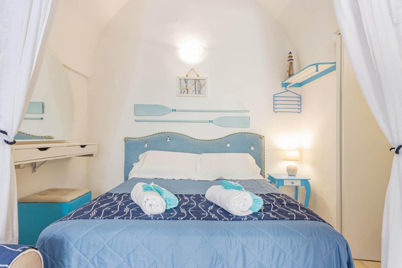 פולינאנו א מארה Extravacanza Dipinto Di Blu מראה חיצוני תמונה