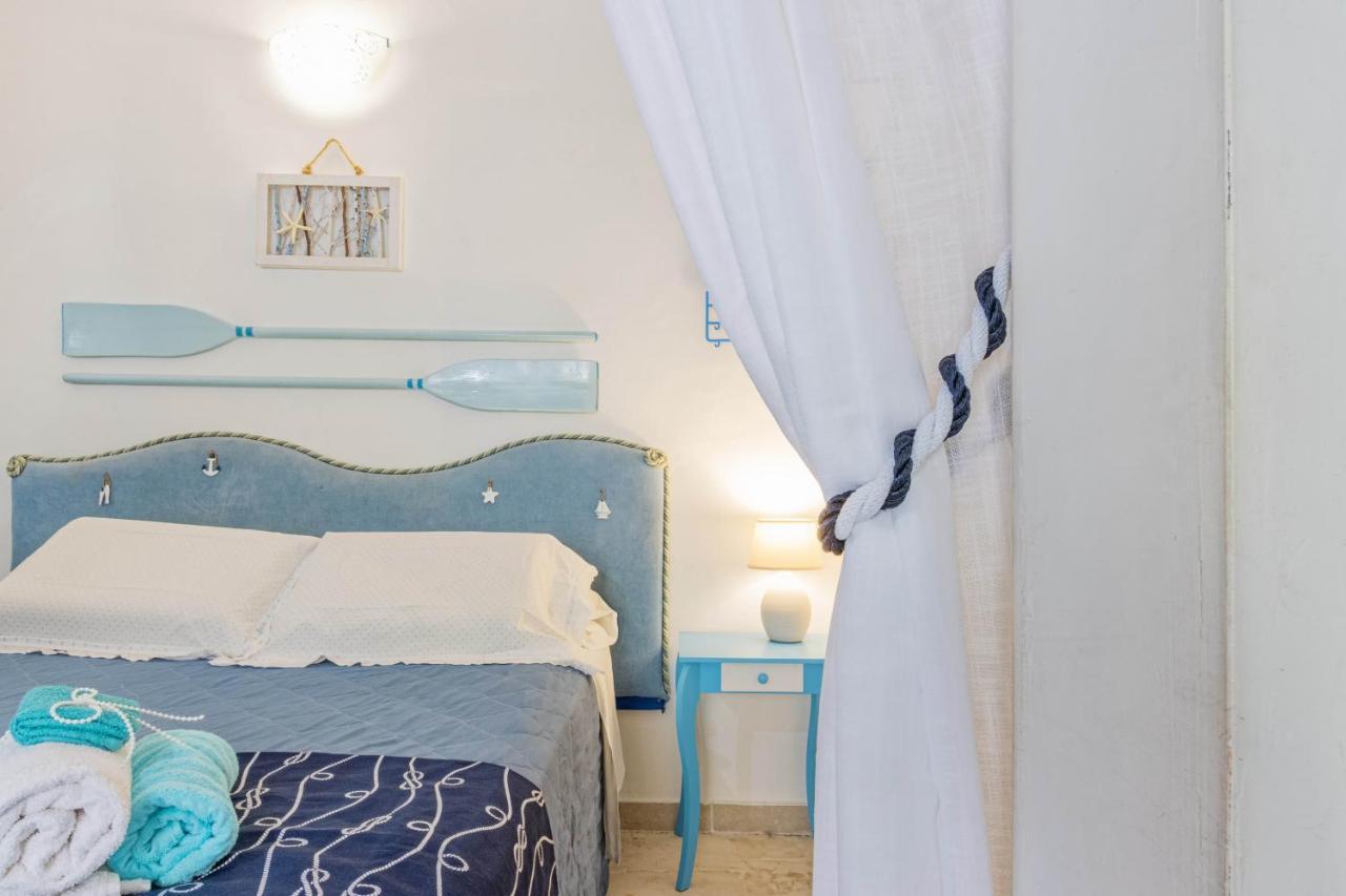 פולינאנו א מארה Extravacanza Dipinto Di Blu מראה חיצוני תמונה